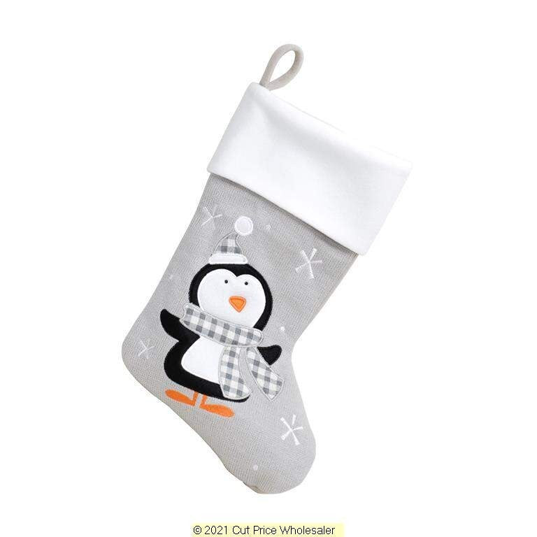 Gray Christmas stocking with a penguin design on a white background
