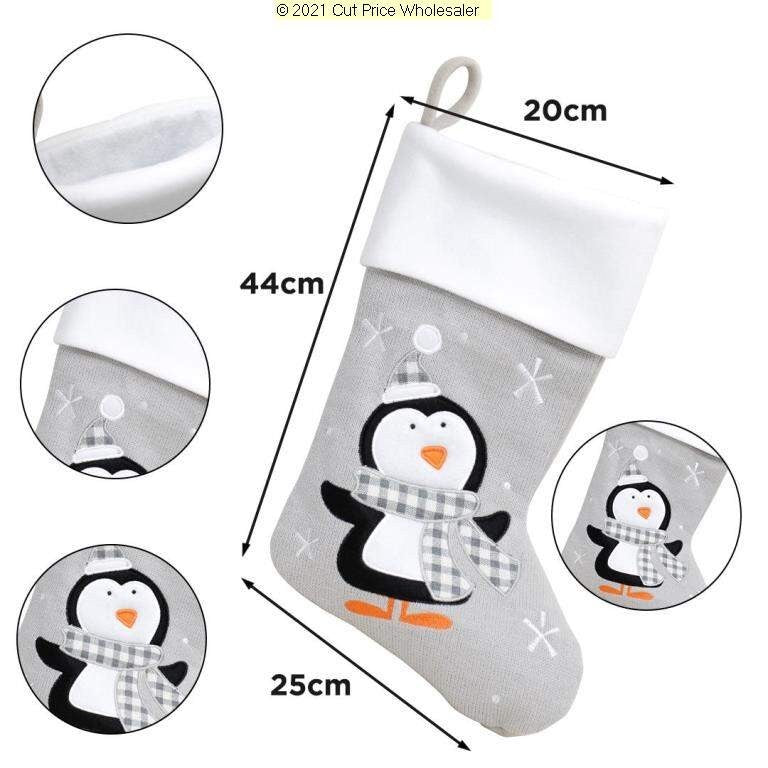 Christmas stocking with penguin design, measurements, and close-up details on a white background.
