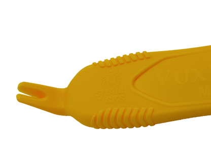 Close-up of the VuxLore MAX tick remover’s small-tick end, showing the narrow forked tip, moulded small ticks label and ridged grips.